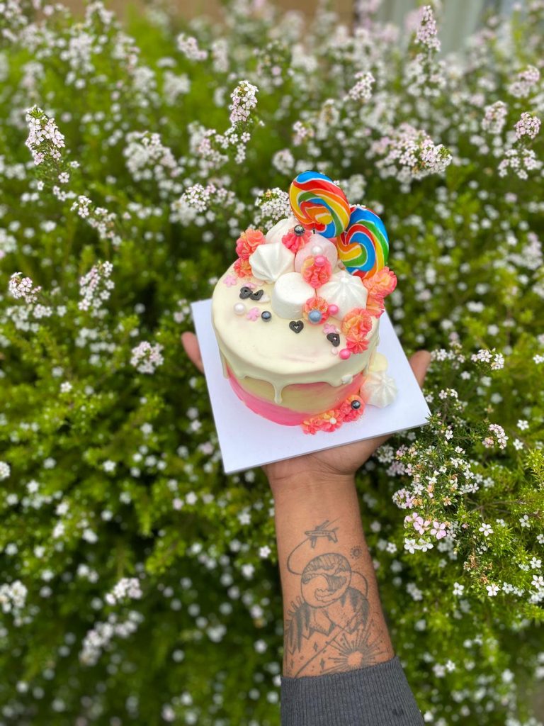 small colorful cake with candies on top